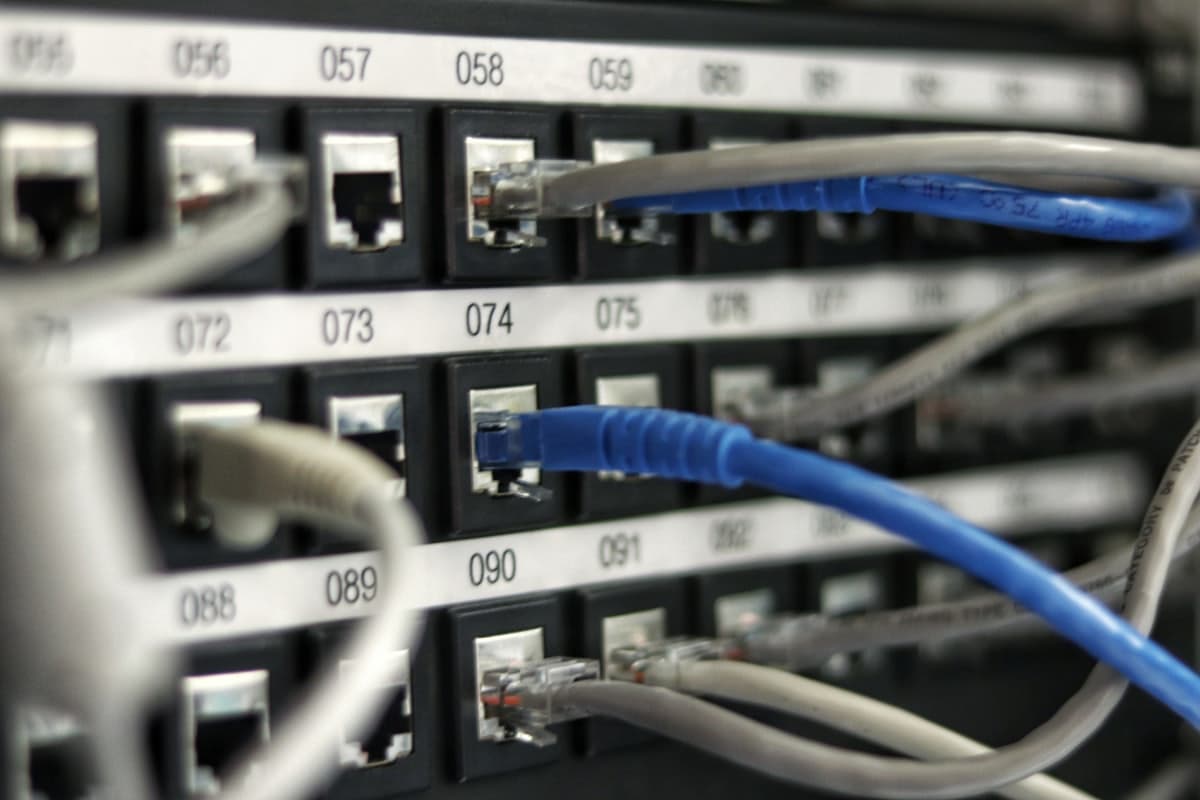 Network rack and switching infrastructure representing enterprise campus networking